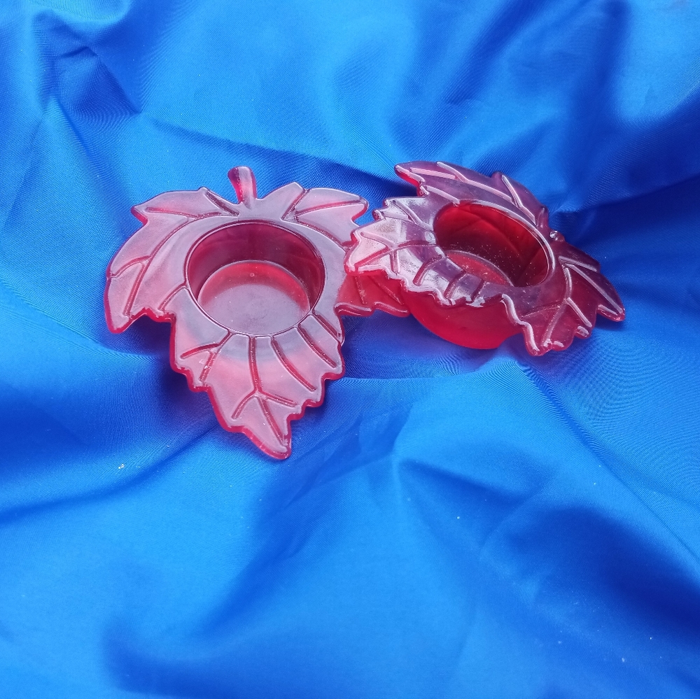 2 vintage orange glass leaf tea-candle holders